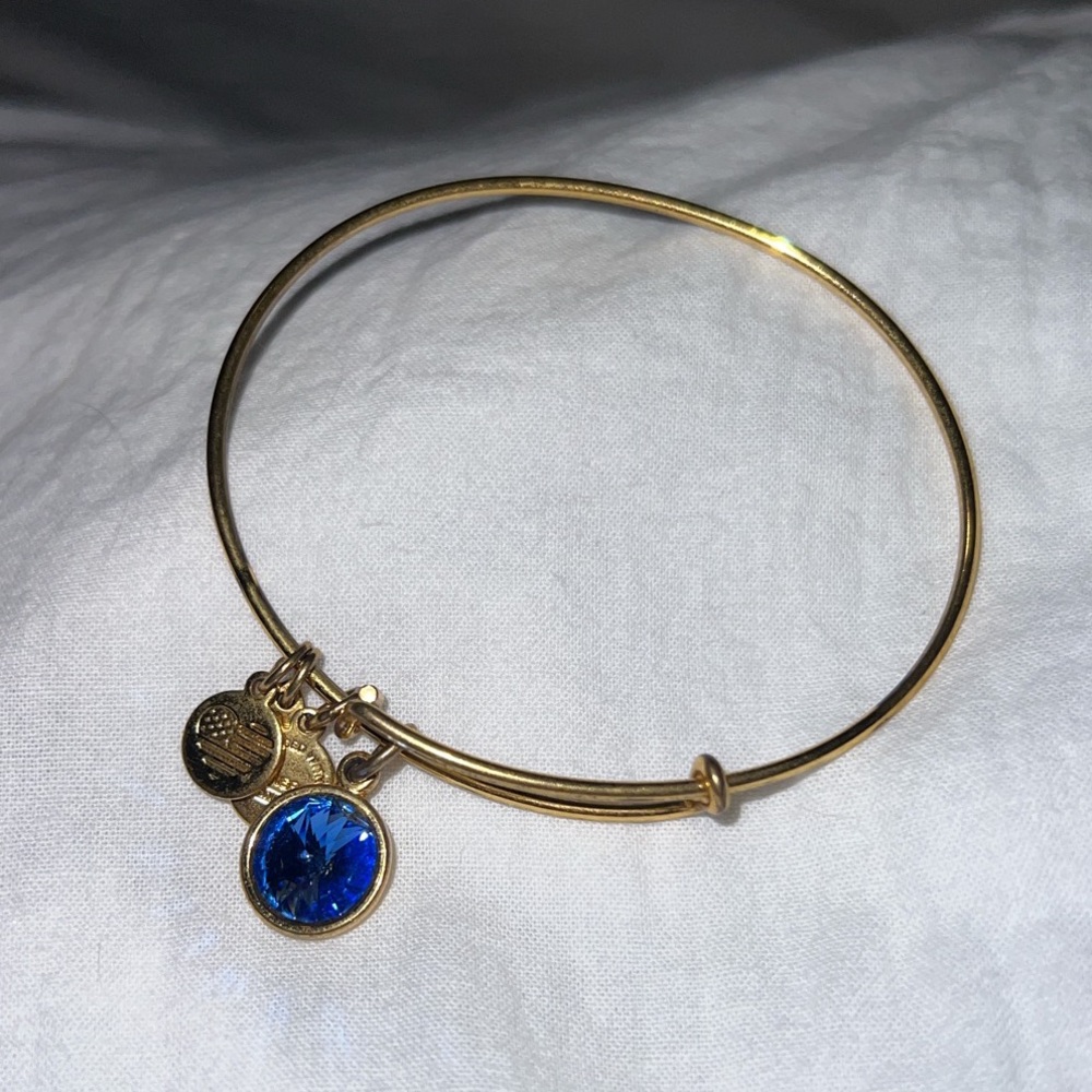 Alex and Ani Blue Sapphire Gold charm bracelet